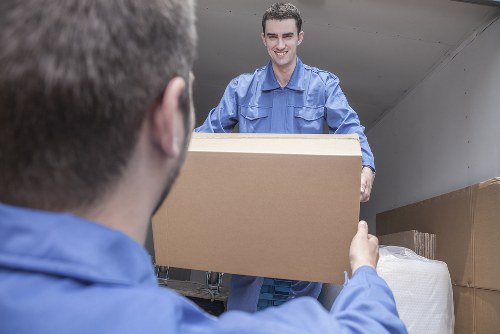 Boxes and furniture in a secure long-term storage unit in Maldenrushett
