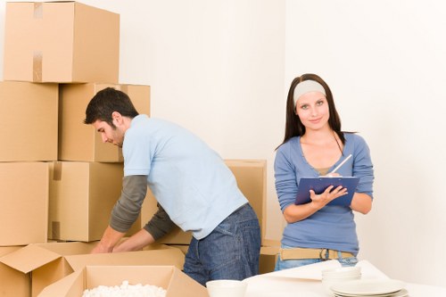 Prepared boxes and furniture ready for man and van transport